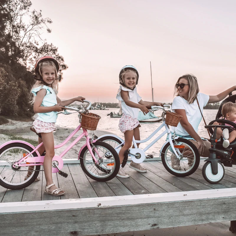 Family of kids bike riders