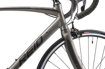 Falco Sport Road Bike in Charcoal showing black Reid logo on downtube from Reid Cycles Australia